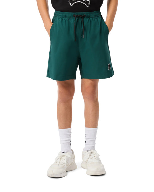 psycho bunny pantaloneta de baño niño hidrocrómico verde