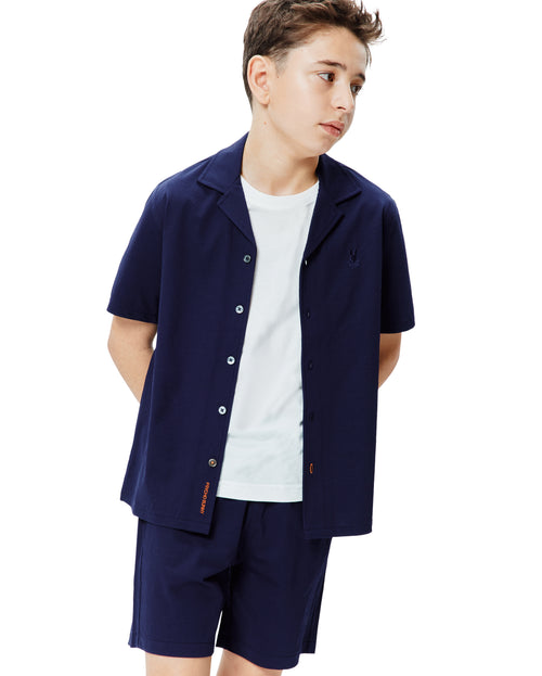 CAMISA M/C PSYCHO BUNNY PARA NIÑO COLOR AZUL KT0300004402