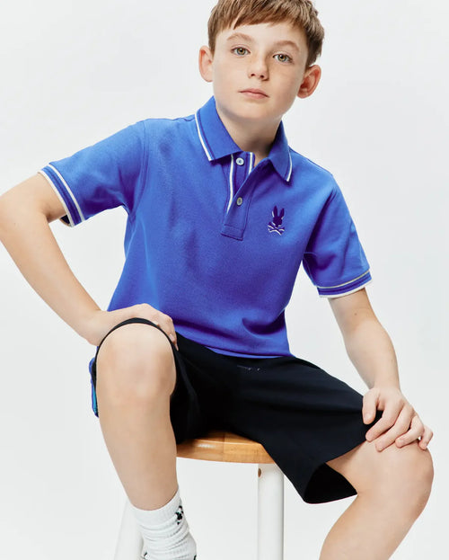 POLO M/C PSYCHO BUNNY PARA NIÑO COLOR AZUL KT0100103426
