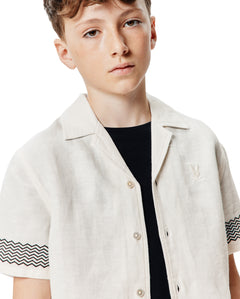 CAMISA M/C PSYCHO BUNNY PARA NIÑO COLOR BLANCO KT0300031250
