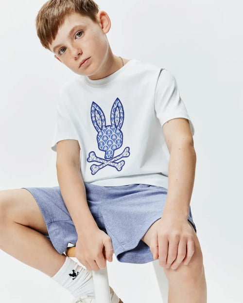 T-SHIRT PSYCHO BUNNY PARA NIÑO COLOR BLANCO KT0200182100