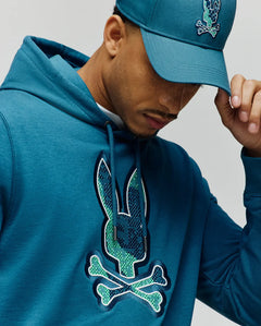 PSYCHO BUNNY SUDADERA CON CAPUCHA CON LOGO BORDADO PIXELADO OLIVIER PARA CABALLERO HOMBRE AZUL MT0500141406