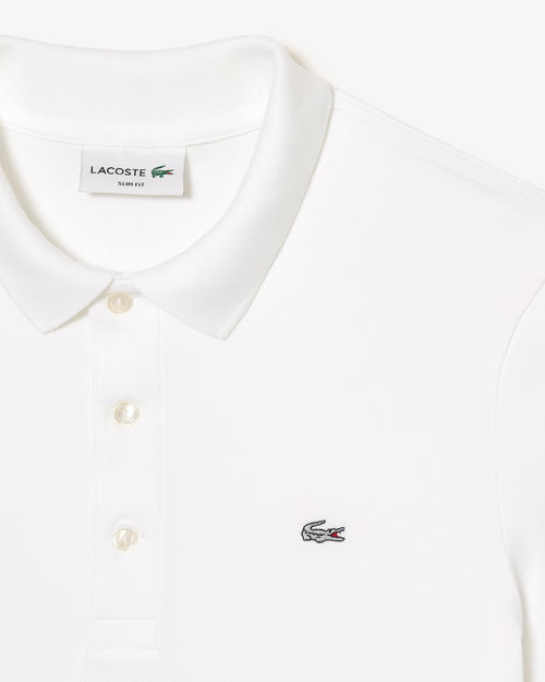 lacoste tipo polo elasizado al cuerpo blanco SLIM FIT