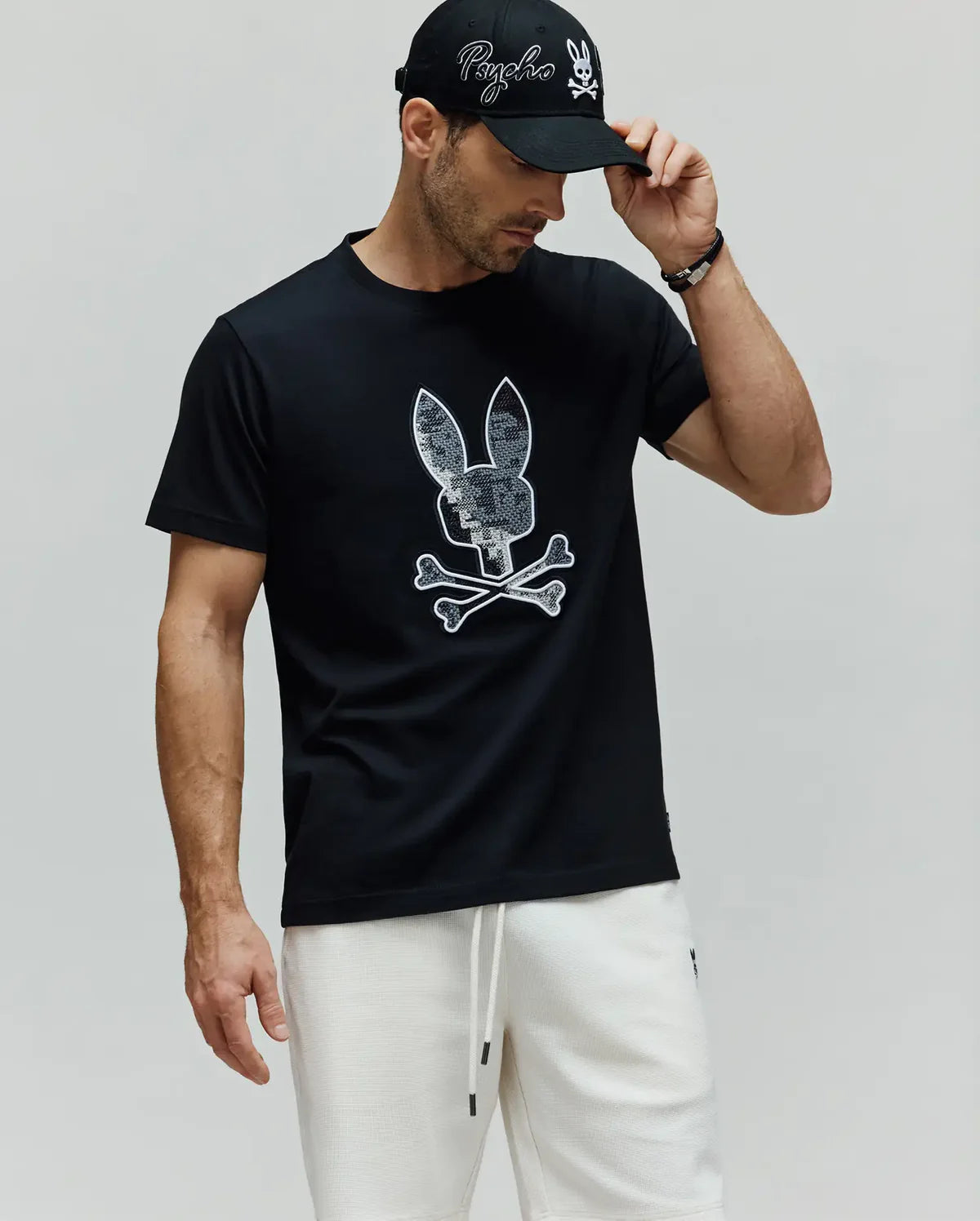 PSYCHO BUNNY CAMISETA ESTAMPADA BORDADA OLIVIER PARA CABALLERO HOMBRE NEGRO MT0200200001
