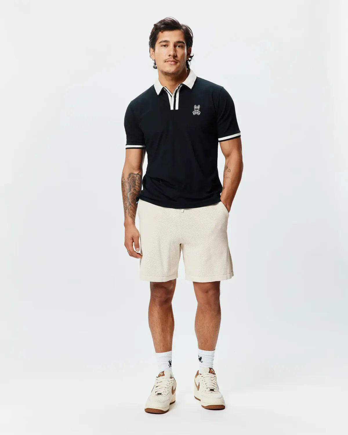 POLO M/C PSYCHO BUNNY PARA HOMBRE COLOR NEGRO MT0100192001