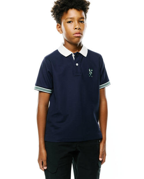 CAMISETA TIPO POLO PSYCHO BUNNY PARA NIÑO COLOR AZUL