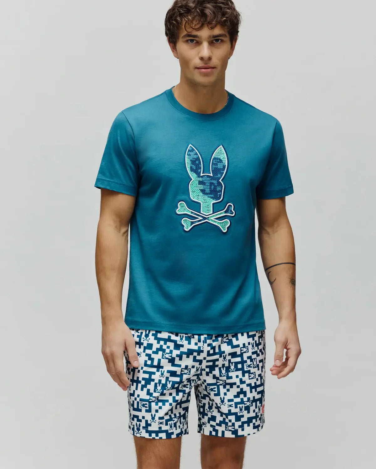 PSYCHO BUNNY CAMISETA ESTAMPADA BORDADA OLIVIER PARA CABALLERO HOMBRE AZUL MT0200200406