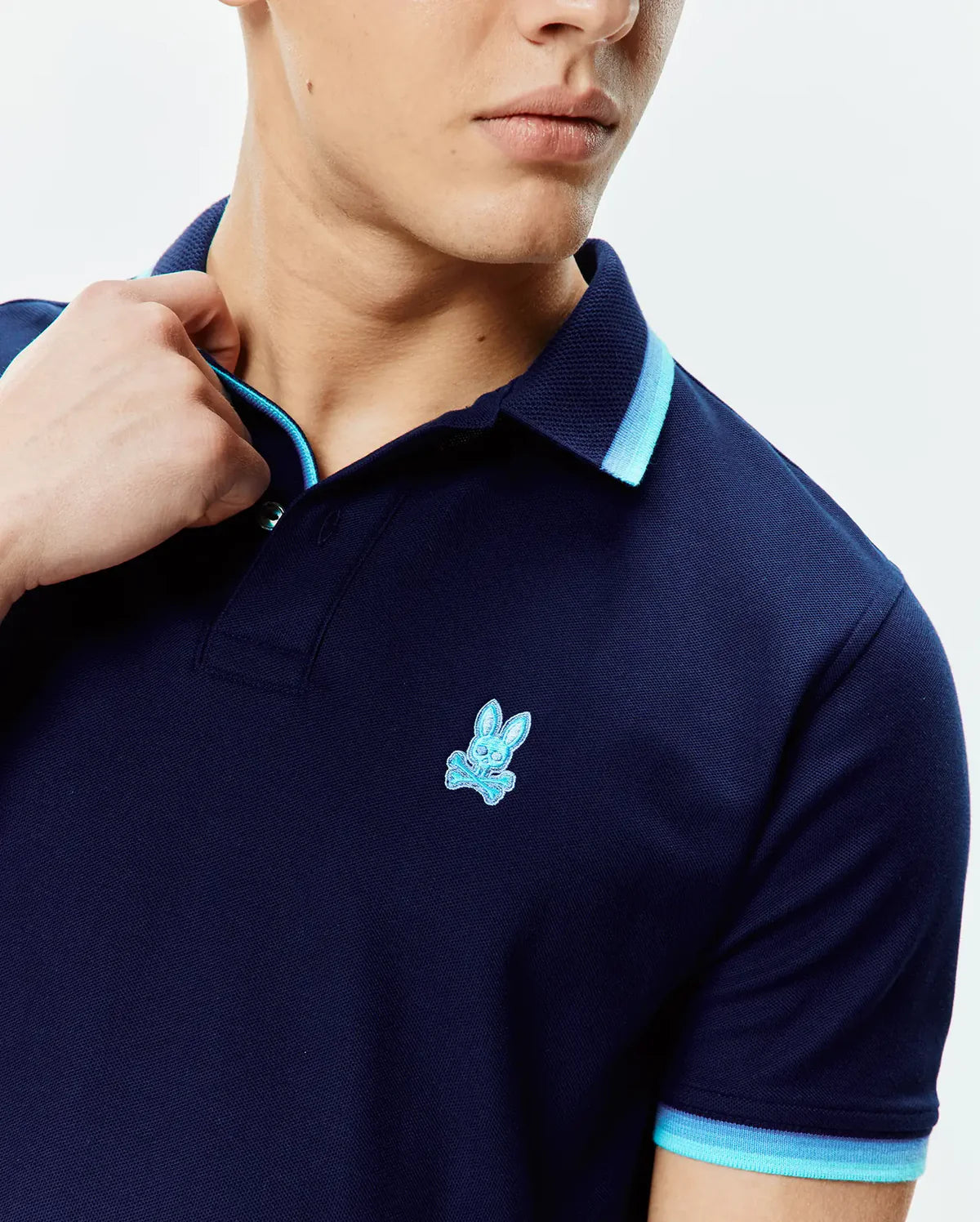 POLO M/C PSYCHO BUNNY PARA HOMBRE COLOR AZUL MT0100184402