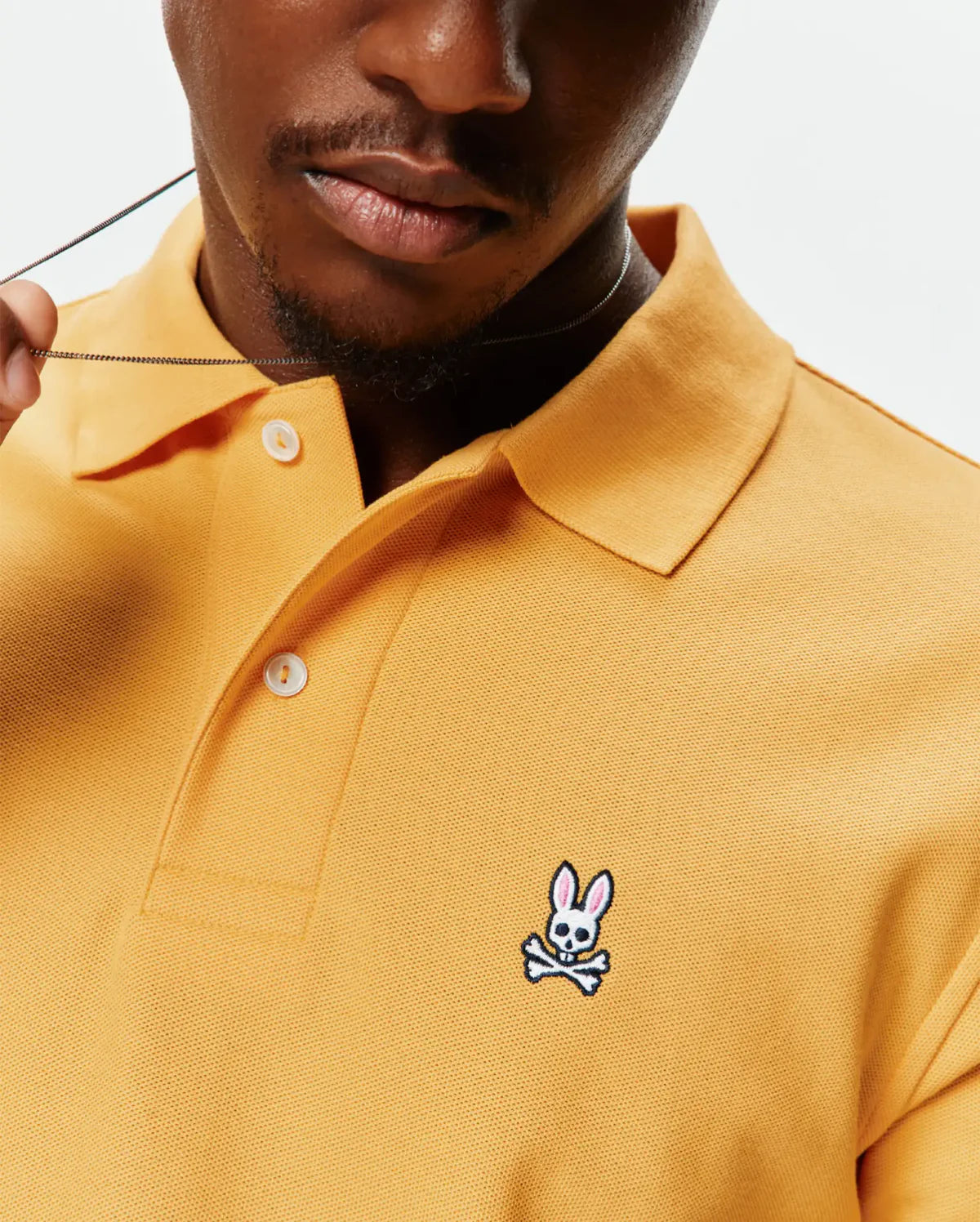 POLO M/C PSYCHO BUNNY PARA HOMBRE COLOR AMARILLO B6K001F200807