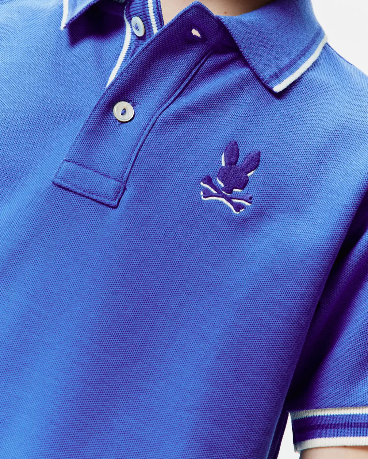 POLO M/C PSYCHO BUNNY PARA NIÑO COLOR AZUL KT0100103426