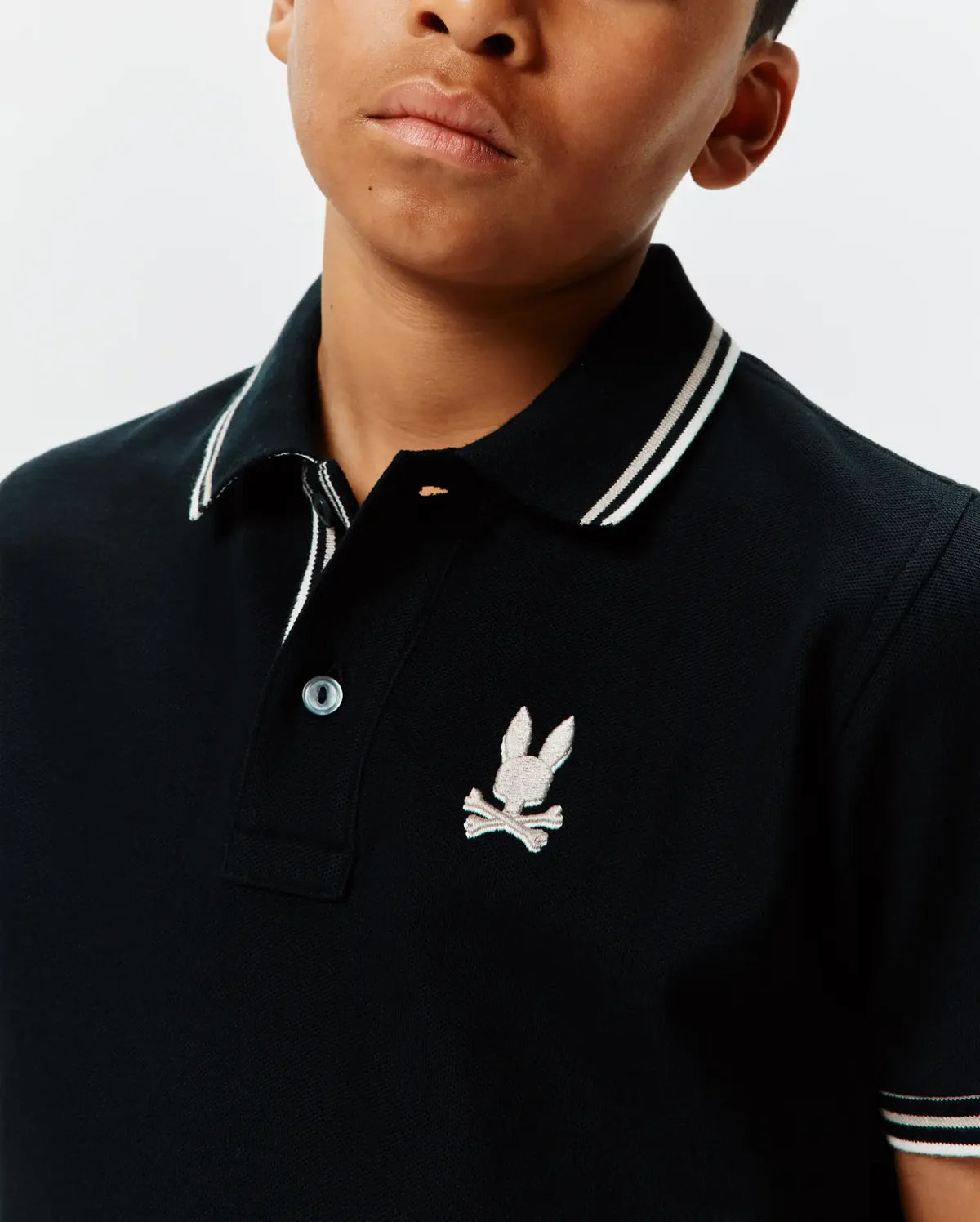 POLO M/C PSYCHO BUNNY PARA NIÑO COLOR NEGRO KT0100103001