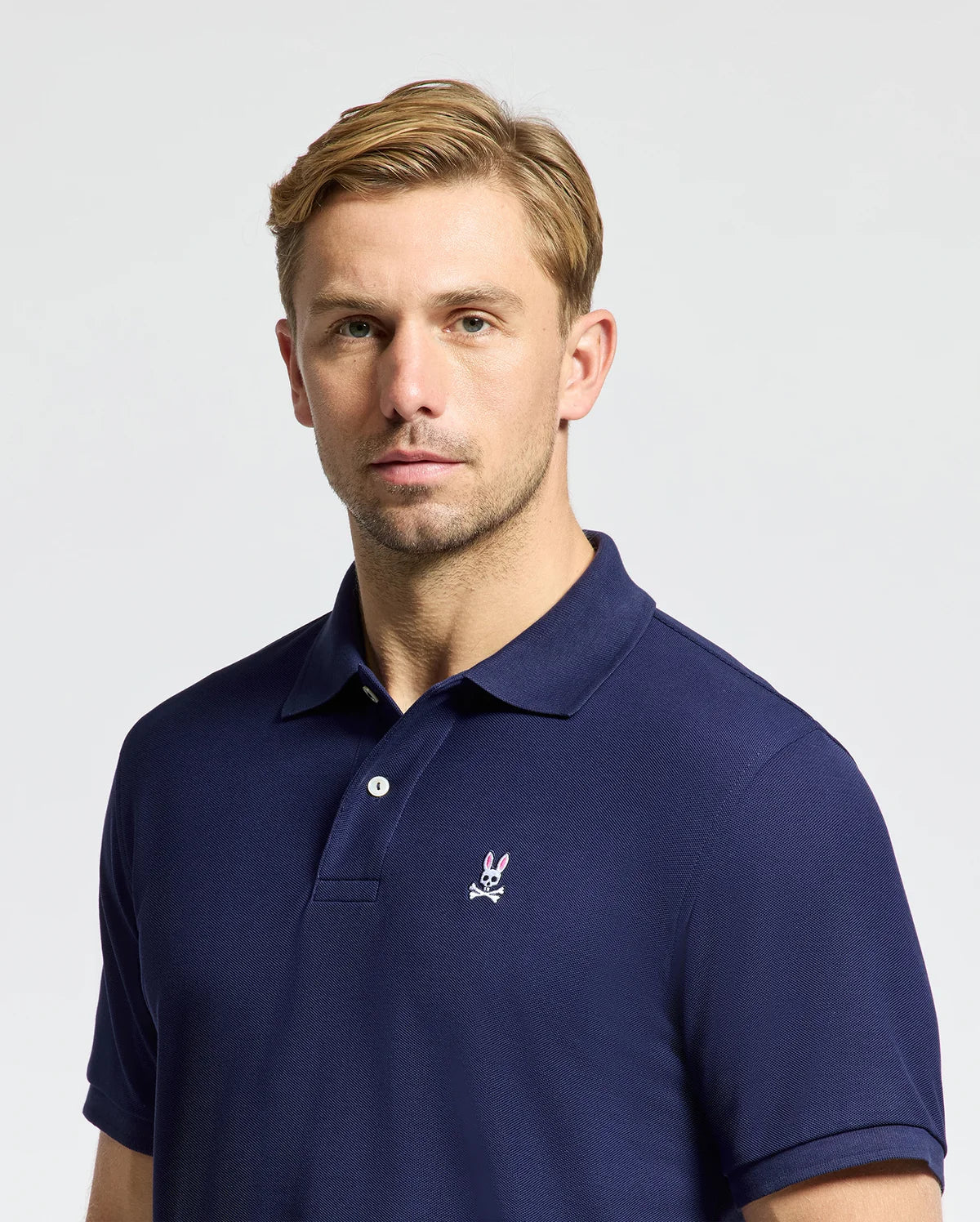 POLO M/C PSYCHO BUNNY PARA HOMBRE COLOR AZUL B6K001CRPCEVB