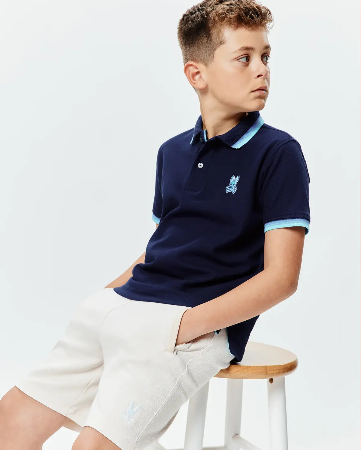 POLO M/C PSYCHO BUNNY PARA NIÑO COLOR AZUL KT0100100322